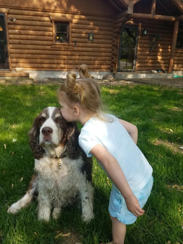 Doc getting some kisses from my older neice